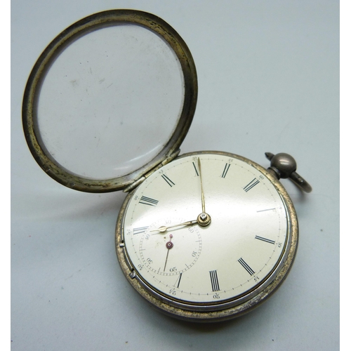 1024 - A silver fusee pocket watch with diamond end stone, a silver vesta case on a silver chain and a silv... 