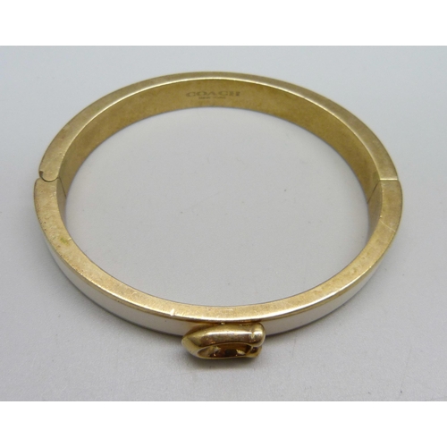 1030 - A vintage Coach NY bangle