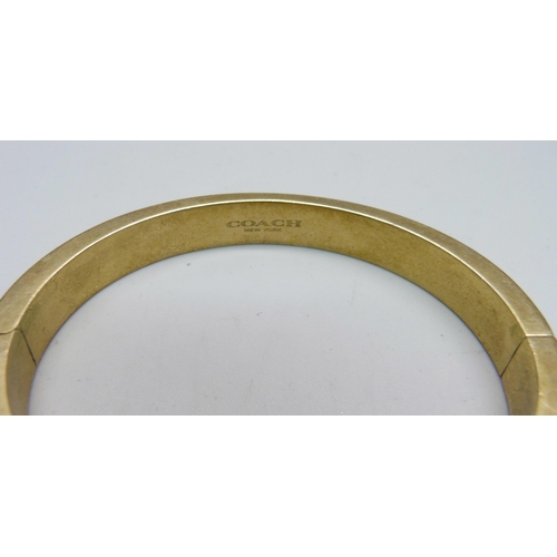 1030 - A vintage Coach NY bangle