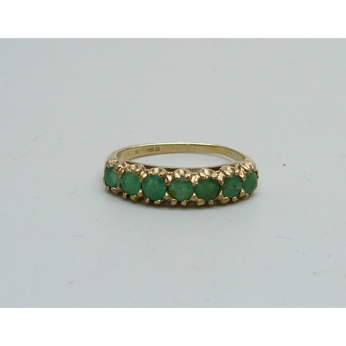 1037 - A 9ct gold and emerald ring, 1.8g, H