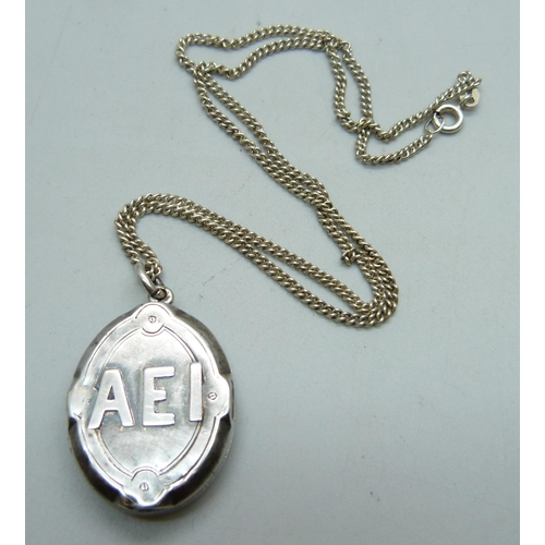 1043 - A Victorian silver AEI locket (Amity, Eternity, Infinity), Birmingham 1879, on a silver chain