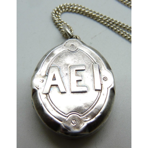 1043 - A Victorian silver AEI locket (Amity, Eternity, Infinity), Birmingham 1879, on a silver chain