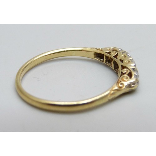 1050 - An 18ct gold and five stone diamond ring, approximately 0.5ct weight, 2.8g, Q