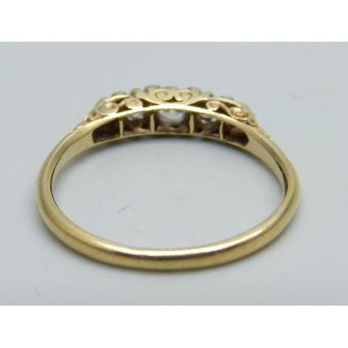 1050 - An 18ct gold and five stone diamond ring, approximately 0.5ct weight, 2.8g, Q