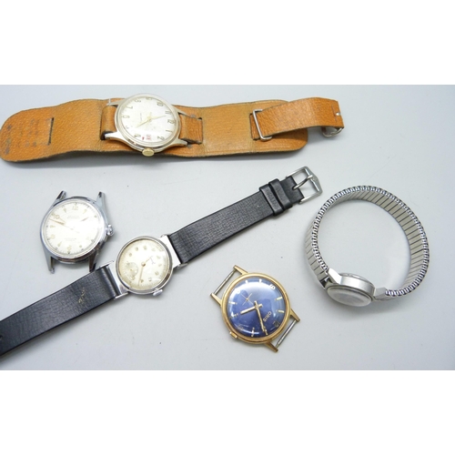 1054 - Five wristwatches, including a lady's Omega, a/f, and Oris with a blue dial