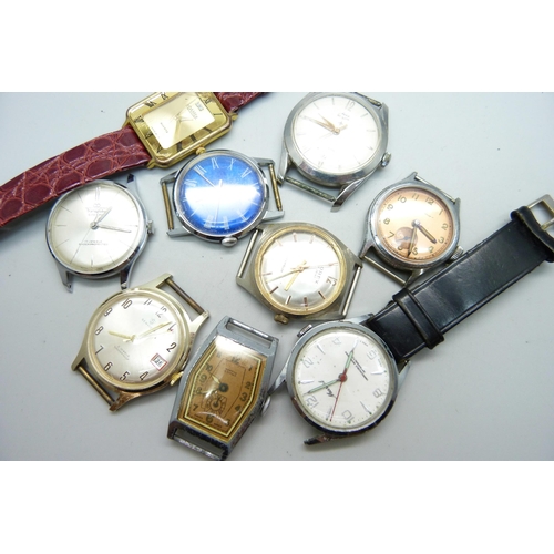 1055 - A collection of nine manual wind and quartz wristwatch heads including Roamer, Services, Oris, Timex... 