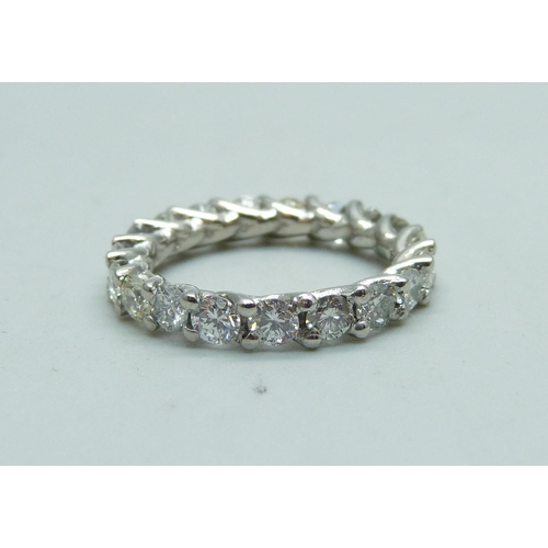 1057 - A hallmarked platinum and diamond eternity ring, total diamond weight 2.02cts, 4.3g, K