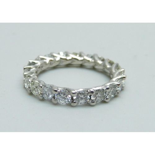 1057 - A hallmarked platinum and diamond eternity ring, total diamond weight 2.02cts, 4.3g, K