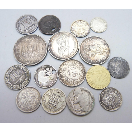 1065 - Sixteen coins; 1911 2 Francs, 1916 Deutsches Reich 10 pfennig, 1943 sixpence, etc.