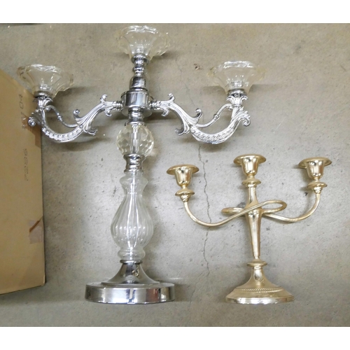 1128 - A quantity of cut glass, a butter dish, a decanter, cut glass serving plates and two candelabra **PL... 