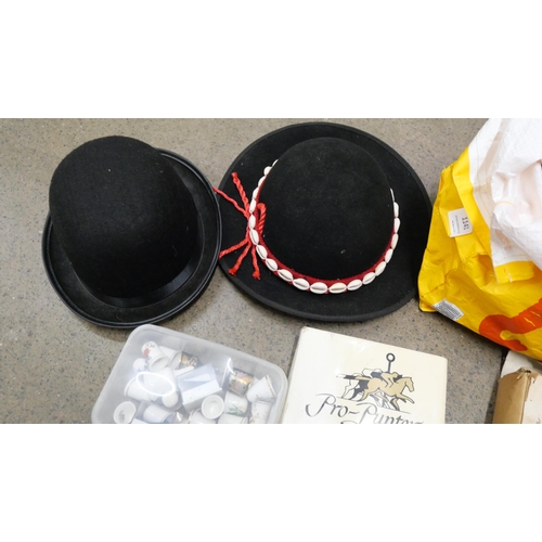 1141 - Assorted items including hats, thimbles, duck figures, DVDs, etc. **PLEASE NOTE THIS LOT IS NOT ELIG... 