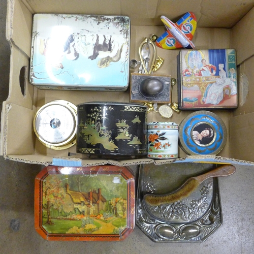 1155 - Assorted decorative biscuit tins, a brush and vintage crumb scoop, a metal World Airlines toy plane,... 