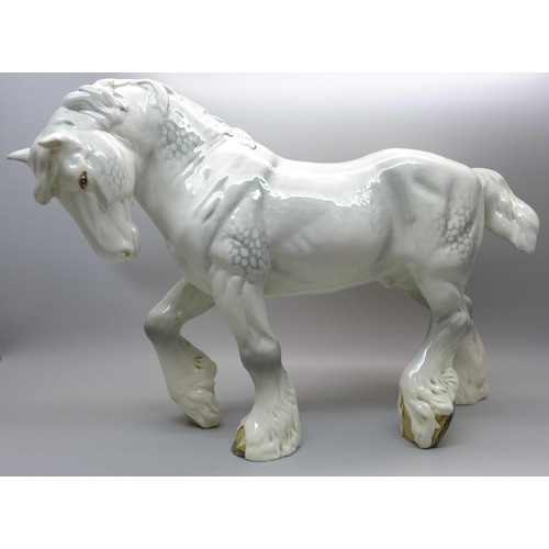 601 - A Beswick grey action gloss shire horse