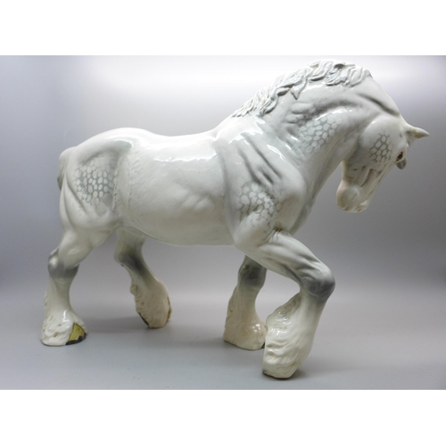 601 - A Beswick grey action gloss shire horse