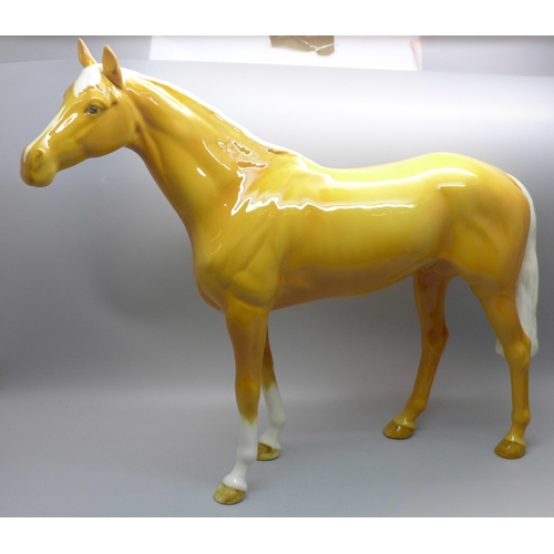 602 - A large Beswick Palomino racehorse
