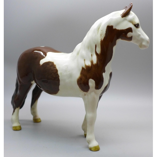 604 - A Beswick Pinto Piebald pony, brown and white