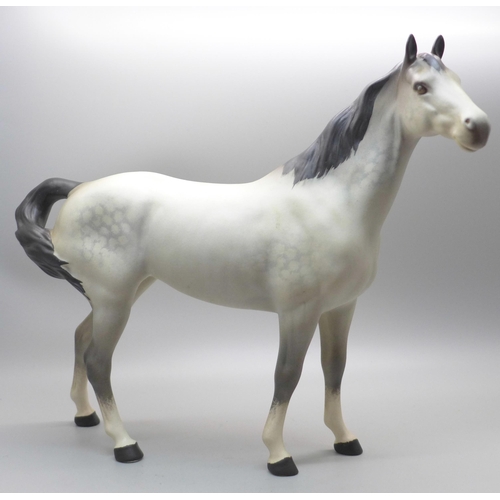 609 - A Beswick dappled grey horse (matt)