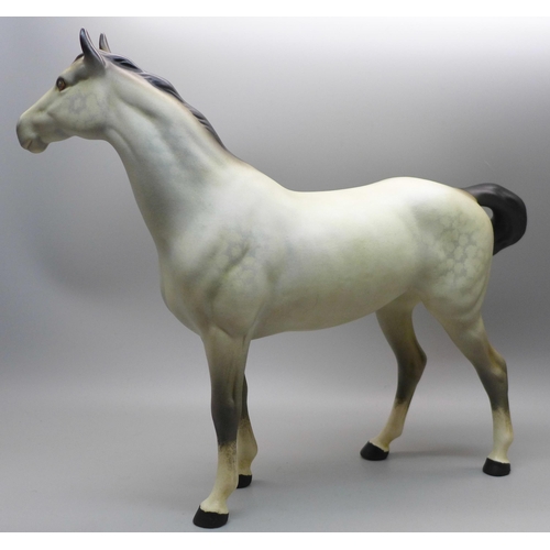 609 - A Beswick dappled grey horse (matt)