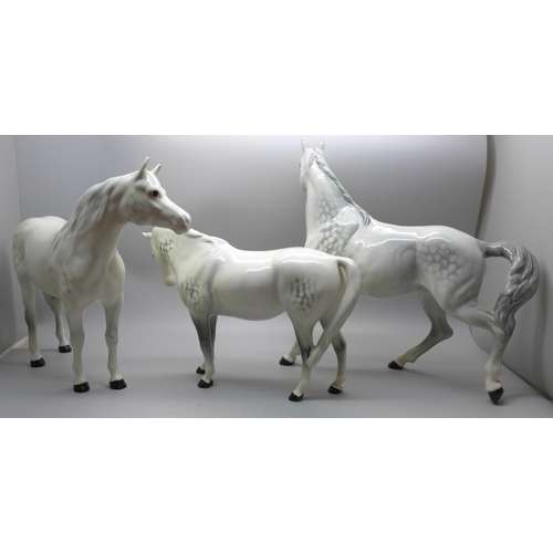 615 - Three Beswick dappled grey horses, one with chip to ear