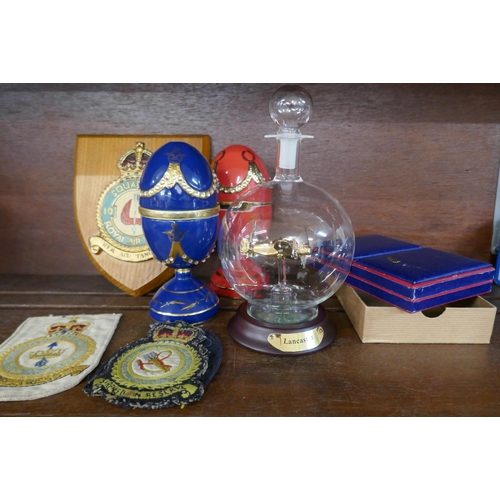622 - Two Bradford Exchange RAF themed eggs with model aircraft, a RAF Squadron 10 plaque, test pilot clot... 