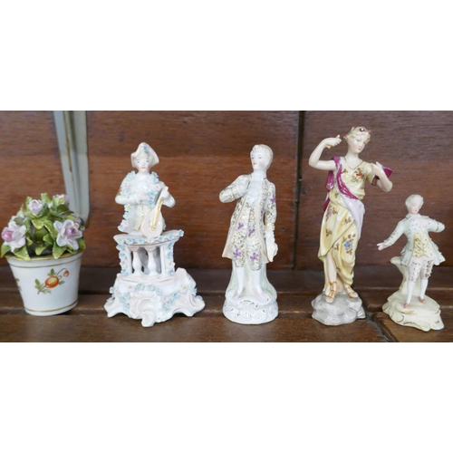 631 - Four small continental porcelain figurines and a Dresden bucket with flowers ornament