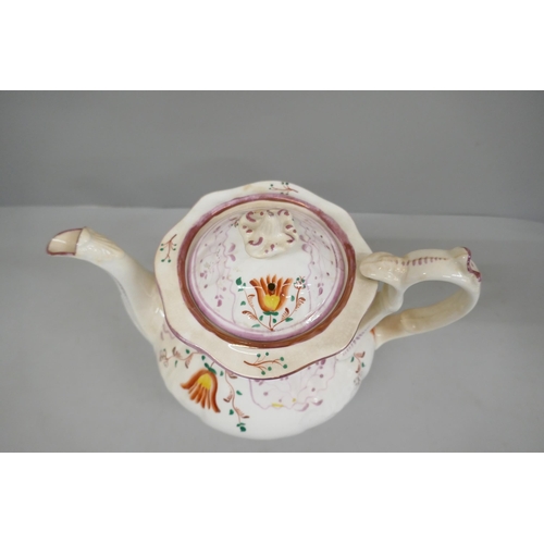 643 - A late 19th Century Staggs pottery lustre teapot