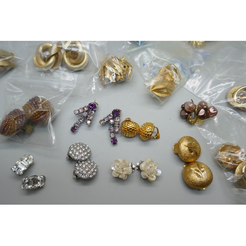 648 - A collection of vintage designer earrings