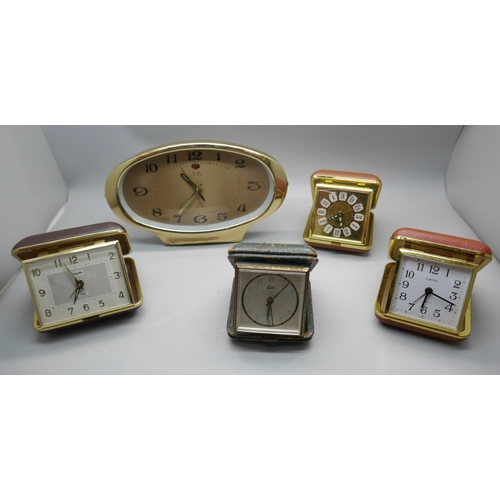 654 - Four travel clocks and a retro Chinese clock