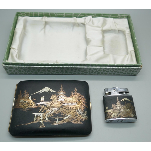 662 - A Japanese Damascene cigarette case and lighter set, boxed