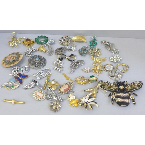 684 - Fifty costume brooches