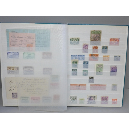 685 - Stamps; a stock book of GB and World Revenue stamps, including entire documents