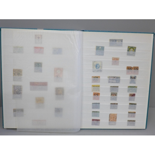 685 - Stamps; a stock book of GB and World Revenue stamps, including entire documents