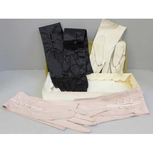 688 - Three pairs of vintage evening gloves, two leather and one silk