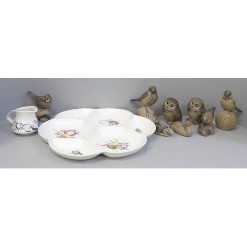 690 - Eight Poole pottery animals; two owls, birds, mouse, etc., a large Poole hors d'oeuvres and milk jug... 