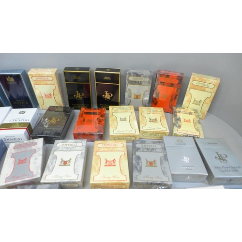 699 - A collection of forty-three sealed and cellophane wrapped dummy cigarette packs from Imperial Tobacc... 