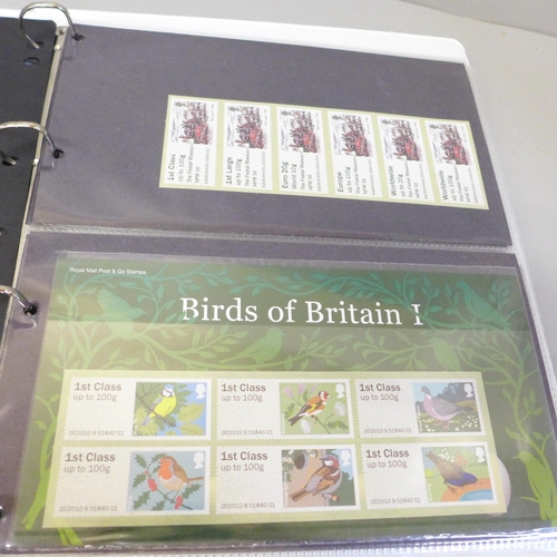 705 - Stamps; an album of GB post and go labels and packs, (face value exceeds £190)