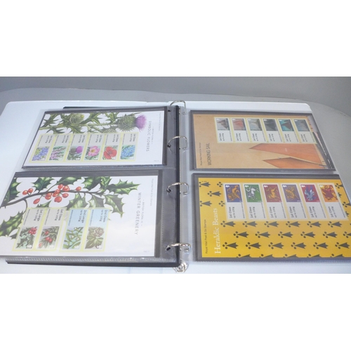 705 - Stamps; an album of GB post and go labels and packs, (face value exceeds £190)