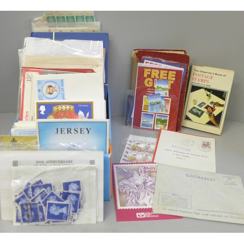 714 - Stamps; a box of stamp albums, covers, presentation packs, etc.