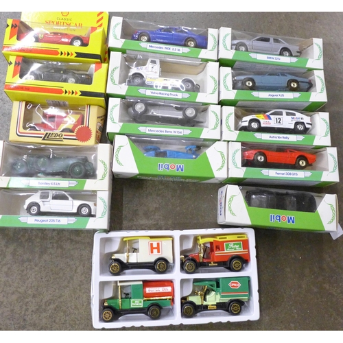 731 - A box of die-cast model vehicles, Mobil, Shell, etc., boxed