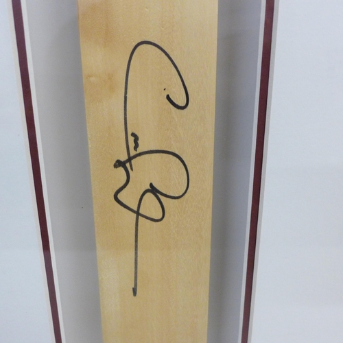 760 - A presentation framed mounted cricket bat, signed by West Indies legend Chris Gayle