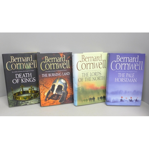 766 - Four hardback first edition novels by Bernard Cornwell from The Lost Kingdom series; The Pale Horsem... 