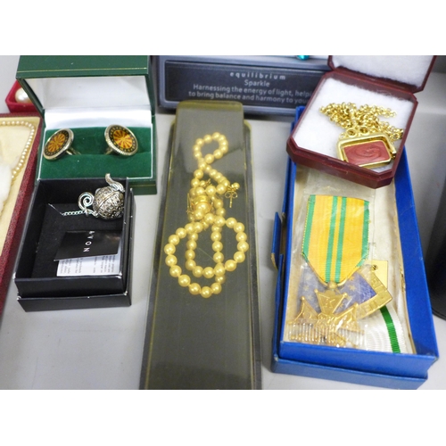 780 - A jewellery box with a quantity of costume jewellery, darts pendant, bracelet, brooches, etc.