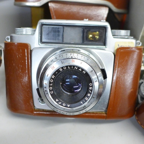 793 - An Agfa Record folding camera, one other Agfa camera and camera accessories