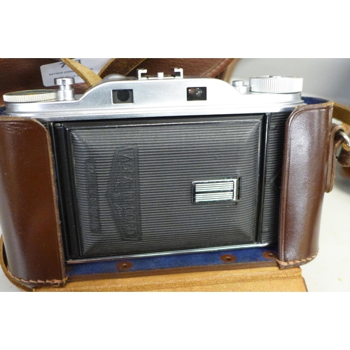 793 - An Agfa Record folding camera, one other Agfa camera and camera accessories