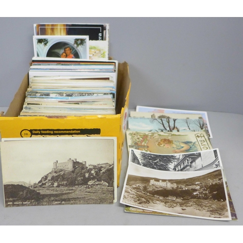 796 - Postcards; a box of postcards, vintage to modern