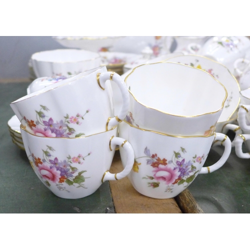 812 - Fifty-five pieces of Crown Derby Derby Posies, a full set of soup bowls and saucers, six teacups, fi... 