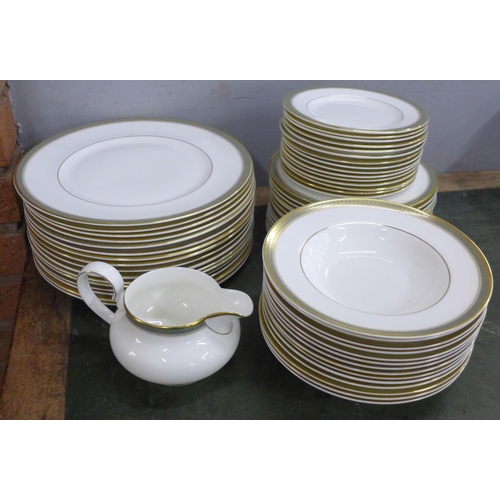 815 - A Royal Doulton Clarendon part dinner service, 16 dinner and side plates, 15 tea plates, 14 soup/cer... 