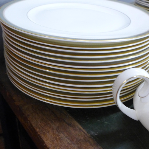 815 - A Royal Doulton Clarendon part dinner service, 16 dinner and side plates, 15 tea plates, 14 soup/cer... 