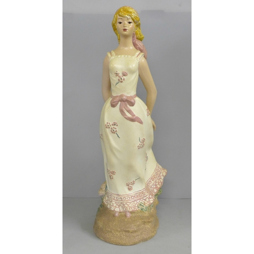 816 - A 1950s plaster figure of a lady, 43.5cm