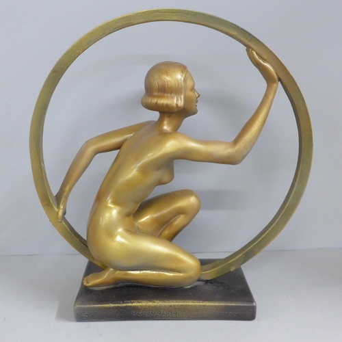 817 - An Art Deco style lady in ring (hoop girl) figure on base, after Leonardi, 29cm